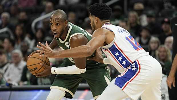 October 26, 2023; Milwaukee Bucks forward Khris Middleton on offense against Philadelphia 76ers forward Tobias Harris